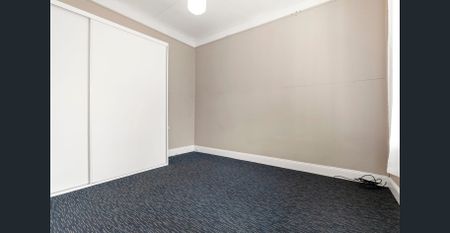 Character filled home on a level sunny block - Photo 2