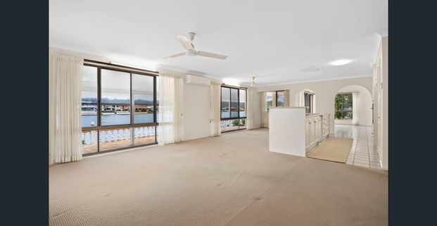 Waterfront Family Home with Pool & Triple Garage - Photo 1