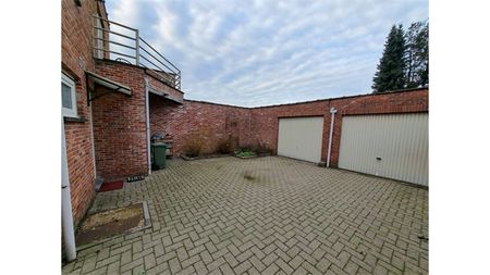 Een rustig gelegen gelijkvloers appartement met garage - Photo 2
