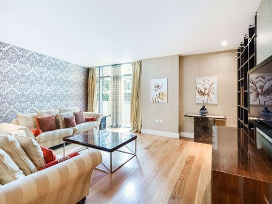 This is a wonderful "Garden Apartment" located in a landmark development in Knightsbridge. The development offers a 24 hour security team, concierge and residents pool and gym complex. - Photo 1