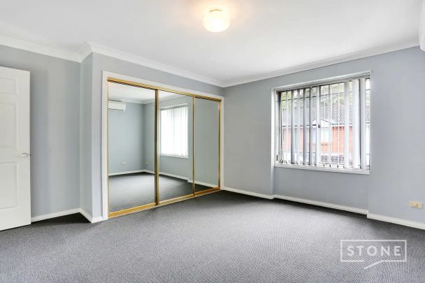 “Updated townhouse in convenient setting” - Photo 1