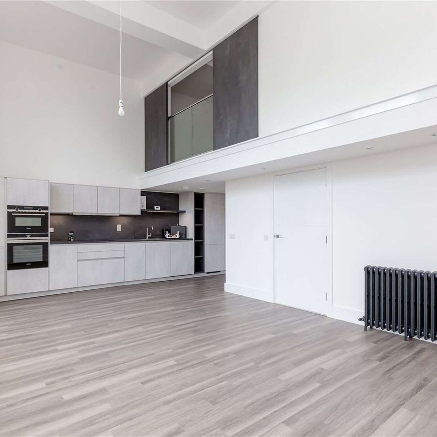 A magnificent modern one-bedroom apartment available on an unfurnished basis with a parking space in this lovely new development. - Photo 1
