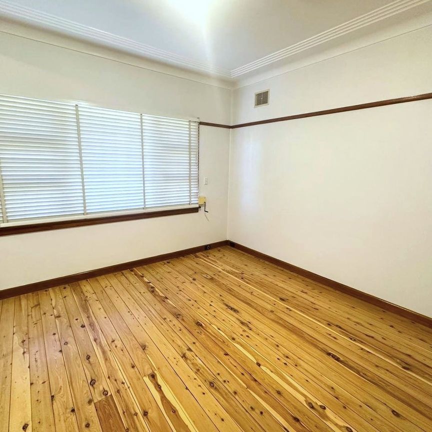 NEWLY UPDATED THREE BEDROOM HOME - Photo 1