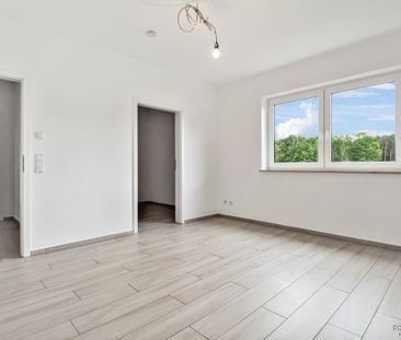 Moderne und großzügige Wohnung mit Einbauküche und Süd-Balkon - Photo 3