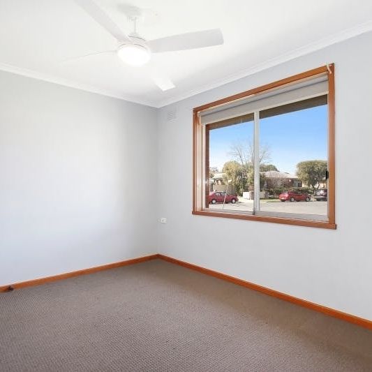 Charming 3-Bedroom Home with Modern Comforts & Outdoor Storage - Photo 1