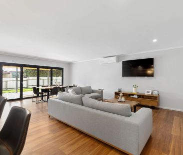 Sleek, Spacious, and Superbly Located - Photo 2