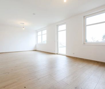 Lichtdurchflutete 2-Zimmer-Wohnung mit 20 m² Terrasse und Grünblick... - Photo 1