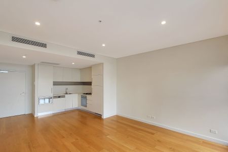 North Facing Bedroom with New Appliances and Floorboards! - Photo 4