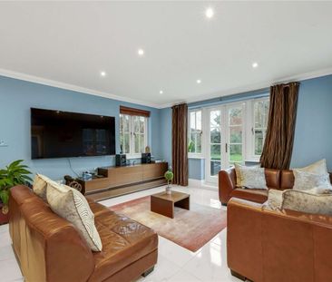 Set within a prestigious private estate, this impressive six bedroo... - Photo 2