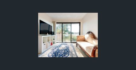 Located at the back of the block offering extra privacy, this two bedroom unit is bright & spacious with convenience at your door step! - Photo 3