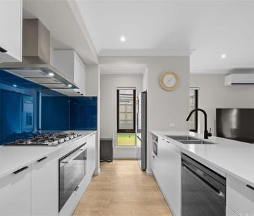 Lowset family home with 3-Car Garage & Side Access! - Photo 2