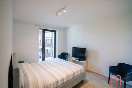 Dit prachtige appartement op het 4de verdiep van residentie “One Baelskaai” in Oosteroever, Oostende, heeft veel te bieden voor wie op zoek is naar een leuke plek om te wonen. - Photo 3