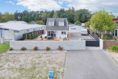 Modern Beachside Living - 3-Bedroom Home in Waikuku Beach - Photo 5