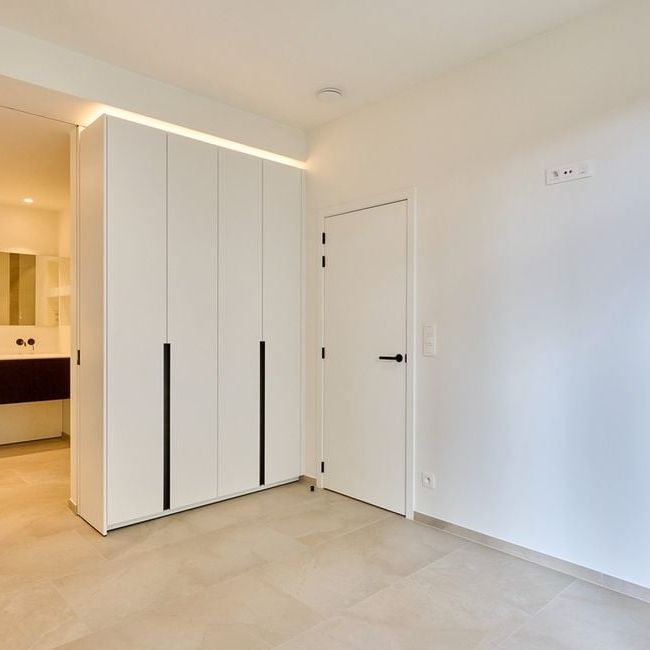 Appartement te huur in Lommel voor € 1.000 met 1 slaapkamer - Photo 1