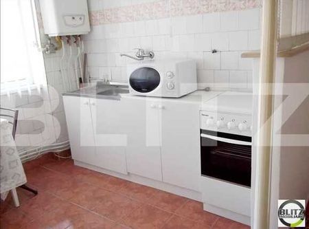 De inchiriat 2 camere, 50 mp + loc de parcare - Photo 2