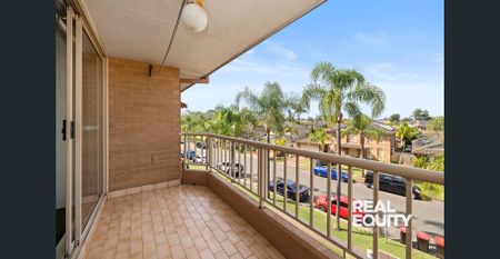 Top-Floor Apartment in a Sought After Lakeside Location - Photo 4