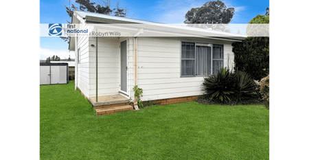 Charming 1-Bedroom Unit with Spacious Yard - Photo 3