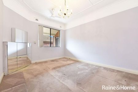 Spacious Two Storey Dual-Family Home with Dual Living Spaces & Water Glimpses - Photo 3