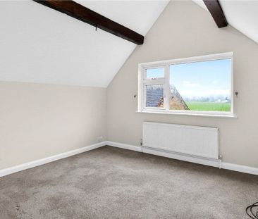 A four bedroom detached family home with a gated driveway in Marston. - Photo 6