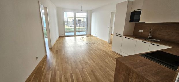 Erstbezug 3-Zi Gartenwohnung mit Terrasse, Fußbodenheizung & Einbauküche in 1220 Wien! - Photo 1