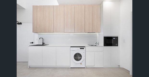 STUNNING MODERN FURNISHED STUDIO APARTMENT - Photo 1