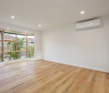 Like New Villa Unit in Prime Location - Photo 1