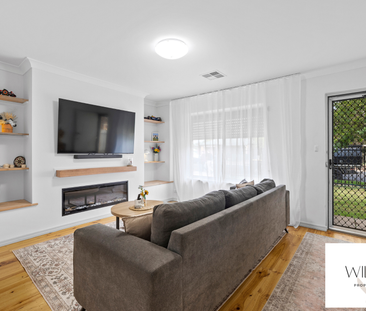 Neat, low-maintenance living with modern comfort! - Photo 1