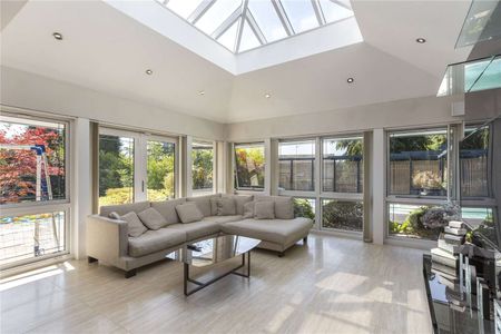 A landmark Arts and Crafts inspired home by Altin Homes on one of Hale’s most prestigious roads, set within approximately one third of an acre with exceptional leisure facilities. - Photo 3