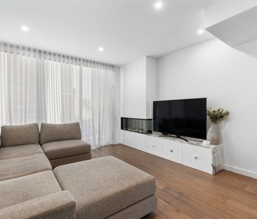 STUNNING FOUR-LEVEL TOWNHOUSE WITH ROOFTOP ENTERTAINING - Photo 1