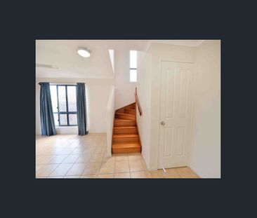 CENTRALLY LOCATED TOWNHOUSE - Photo 1