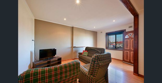 Spacious home with added extras - Photo 1