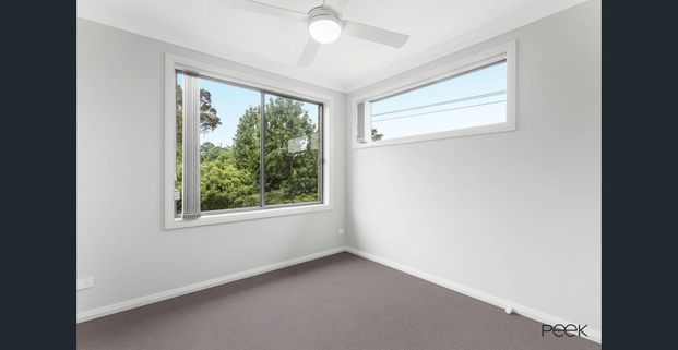 Comfort Meets Convenience in This Modern Townhouse - Photo 1