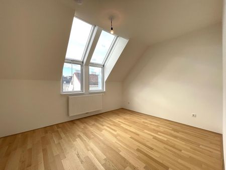 Klimatisierte DG-Wohnung mit hofseitigem Balkon! Baujahr 2021! - Photo 4