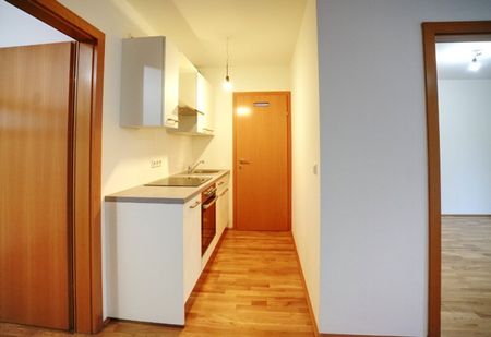 LIEFERING: Kompakte 2-Zimmer Wohnung mit Terrasse, Garten und Tiefgarage „Wunschlos glücklich!“ - Foto 4