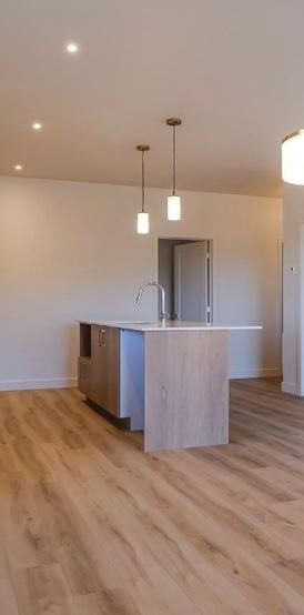 4 1/2 condo locatif neuf - Photo 1