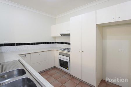 Two Ensuite Bedrooms, Balcony and Private Yard! - Photo 5