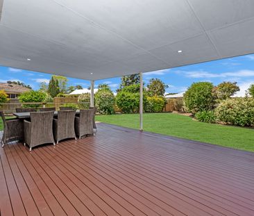 Family-Friendly Gem with Expansive Entertaining Deck & Yard Maintenance Included - Photo 2