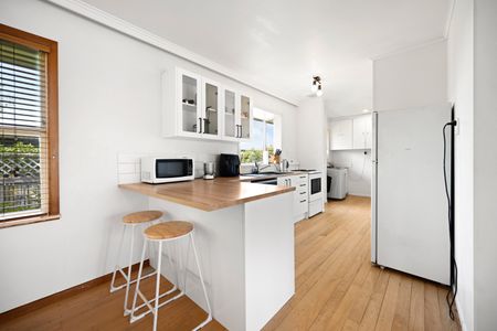 This a fantastic, neat and tidy home with a large living room with ranch slider to the front deck, dining room open to the runway kitchen, three bedrooms, full family bathroom with bath and shower, large yard with bountiful fruit trees, double carport, at the end of a quiet cul de sac. - Photo 2