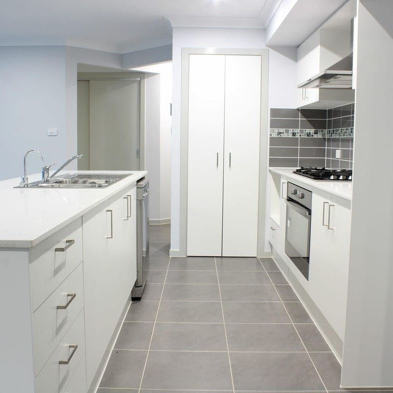 Modern Four Bedroom Family Home In A Sought After Neighbourhood - Photo 1