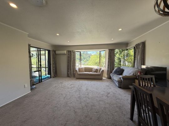 Modern Three-Bedroom Home with Sunroom and Stunning Views - Photo 1