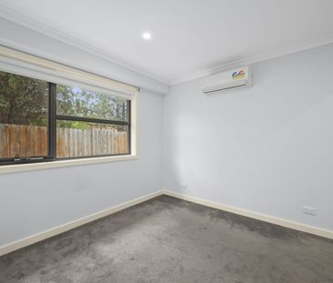 Stylish Two-Bedroom Townhouse In a Most Convenient Location - Photo 3