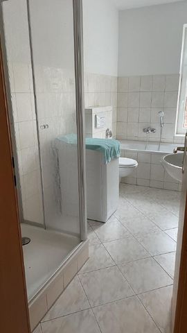 Erdgeschosswohnung mit Einbauküche - Photo 4