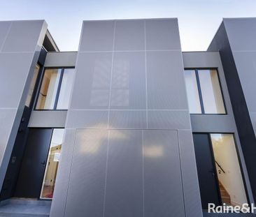 Architectural Townhouse In Brunswick Awaits - Photo 6