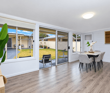 Comfortable Family Home with Utility Bills Included - Photo 2