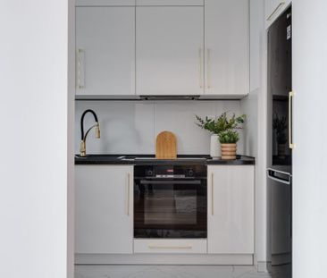 Przestronna kawalerka w prestiżowym budynku 31.71 m² - Zdjęcie 6