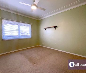 Spacious 4-Bedroom Home in Prime Family-Friendly Location - Photo 3