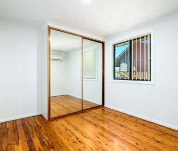 UPDATED FOUR BEDROOM HOME! - Photo 1