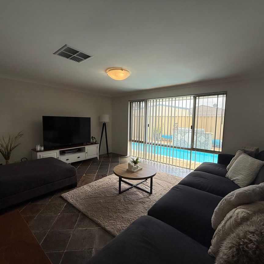 Spacious Family Living with Multiple Living Areas and an Underground Pool - Photo 1