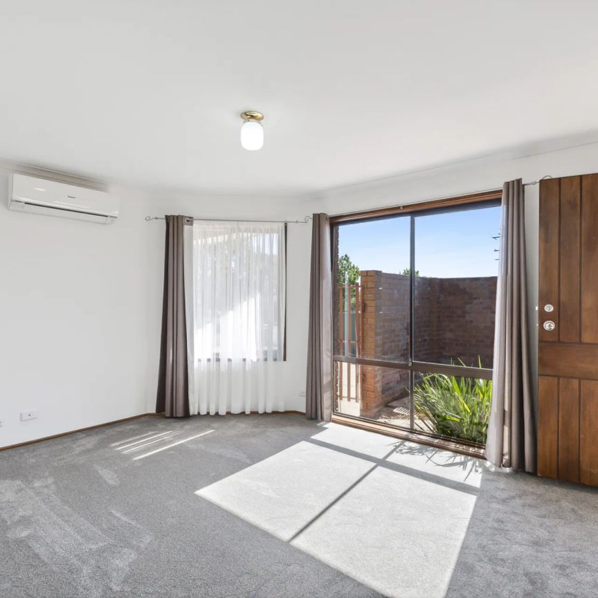 Single level townhouse in a small complex - Photo 1