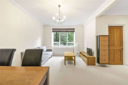 A well‑presented two bedroom apartment situated on the first floor - Photo 3